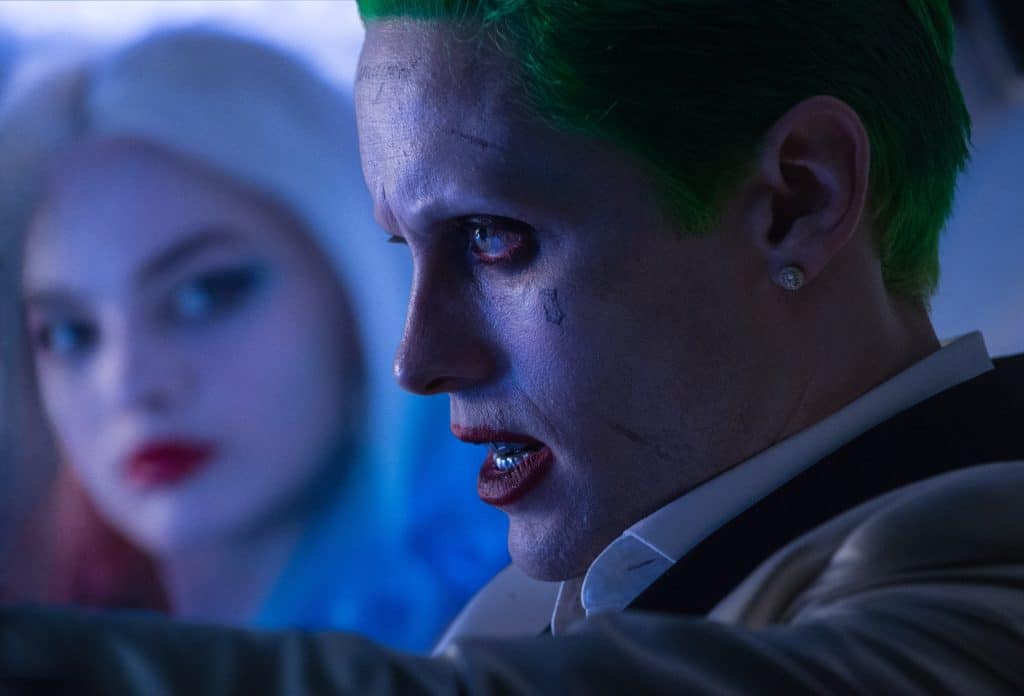 (L-r) MARGOT ROBBIE as Harley Quinn and JARED LETO as The Joker in Warner Bros. Pictures' action adventure "SUICIDE SQUAD," a Warner Bros. Pictures release. Photo credit: Clay Enos/ TM & (c) DC Comics